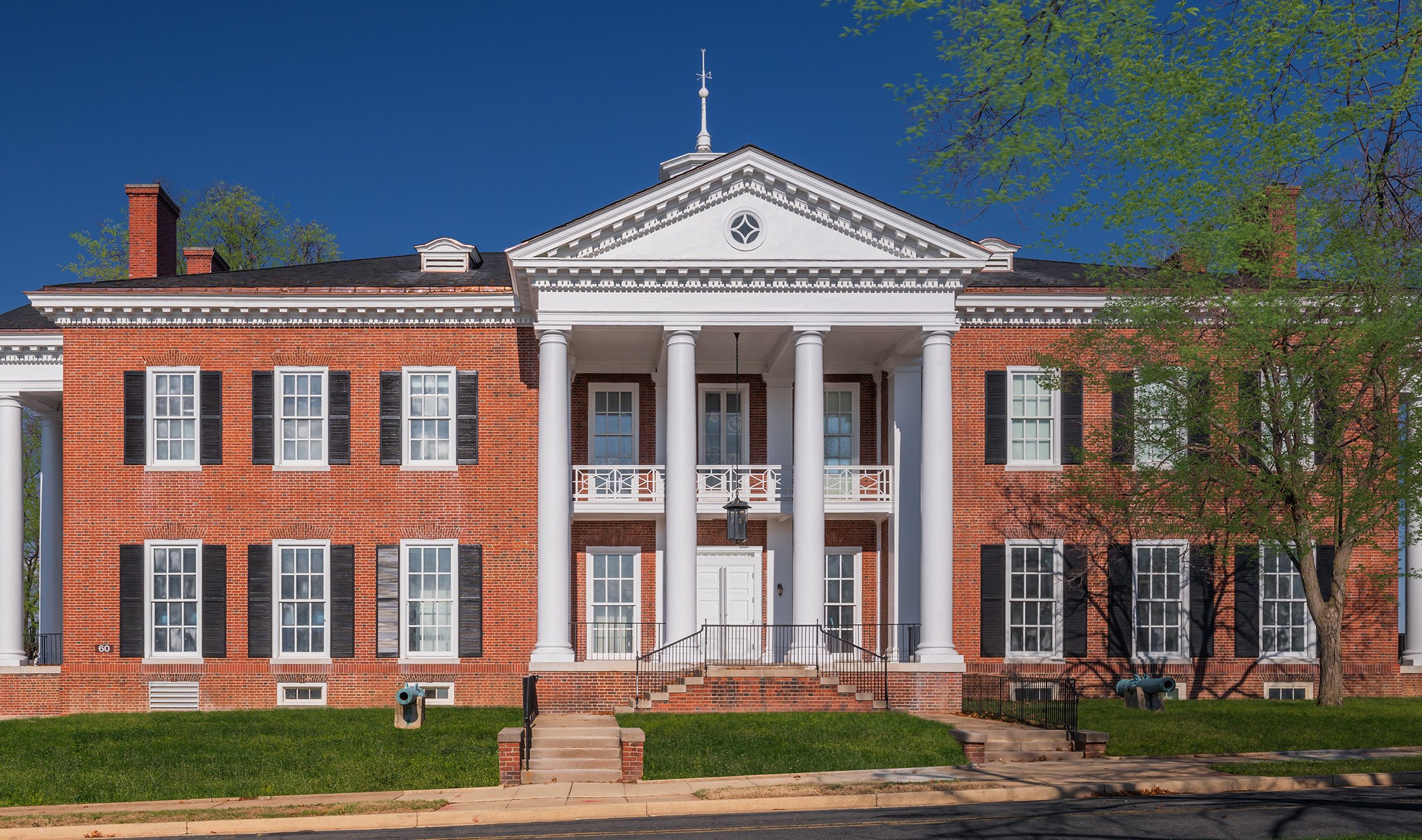 Exterior view of the renovated Inter-American Defense College, including recreated wooden entry doors